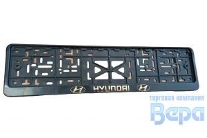 Рамка для номера с защелкой с надписью (рельефная) 'HYUNDAI' золото